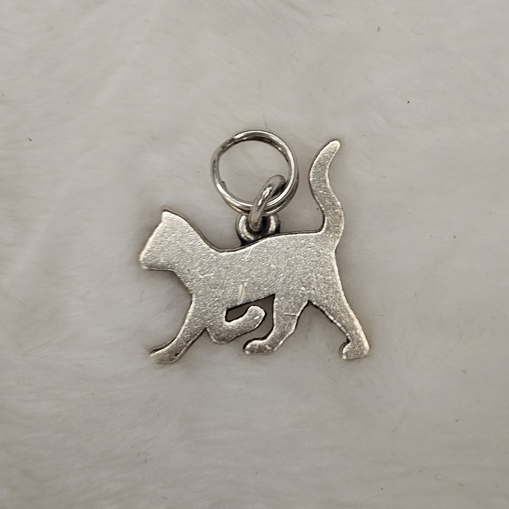 James Avery sterling silver Retired "Silhouette of Prancing Cat" charm.